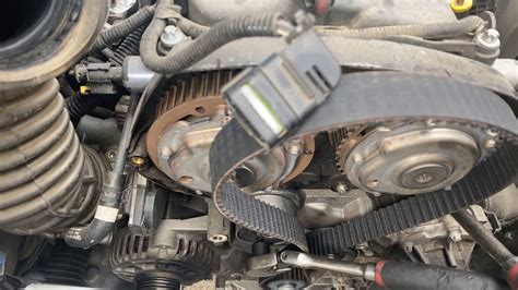 chevy sonic timing belt replacement.